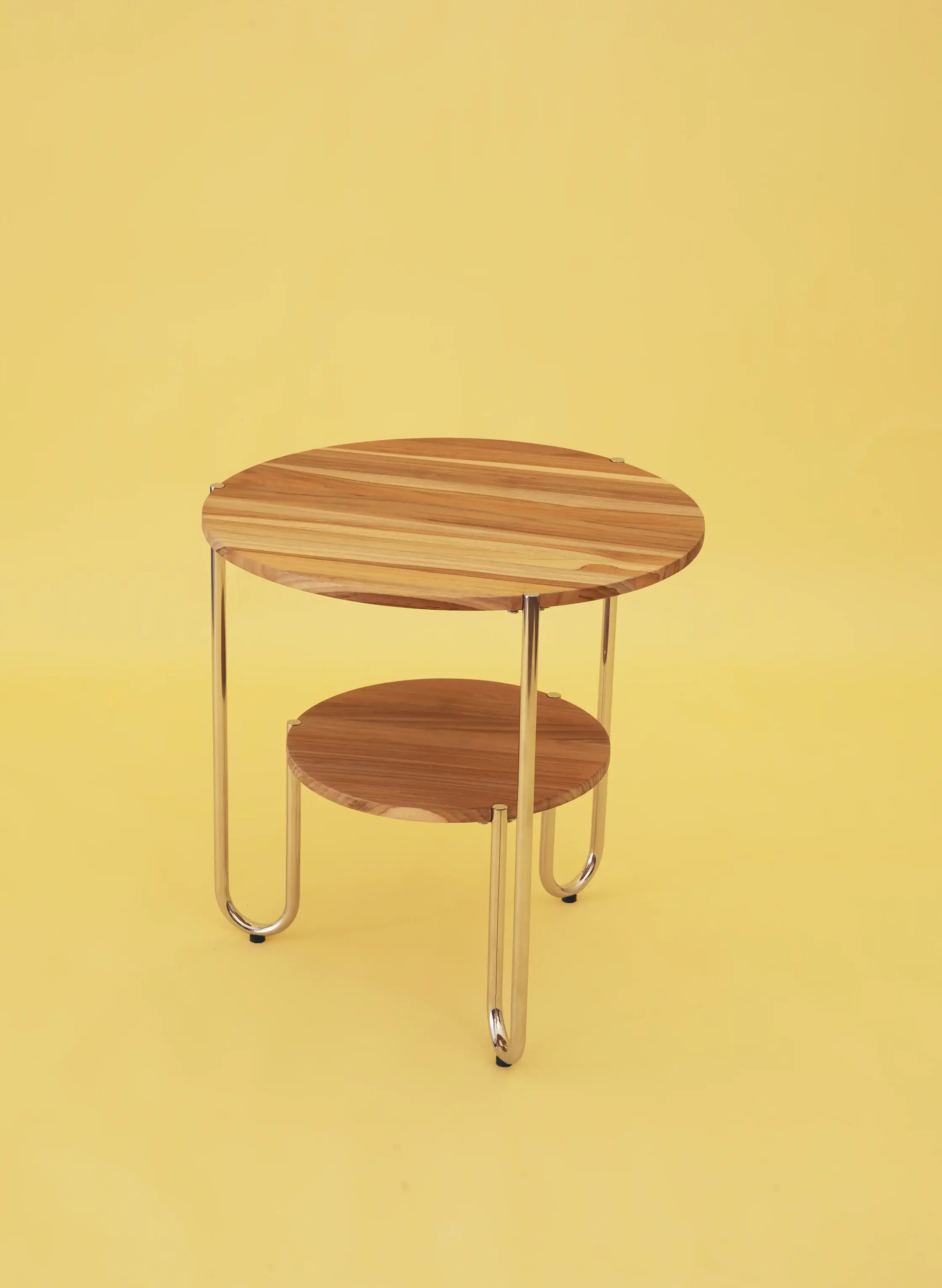 Begja table showing curved metal and geometric construction