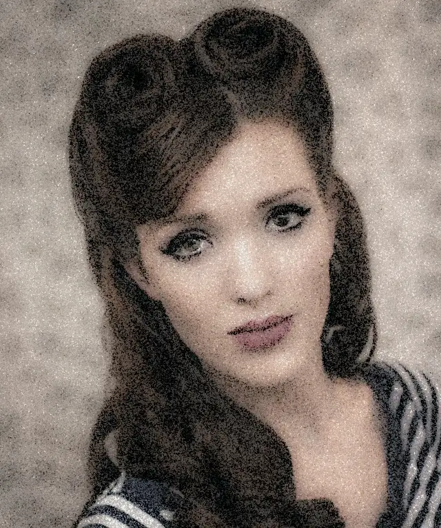 Female rockabilly bun hairstyle reference
