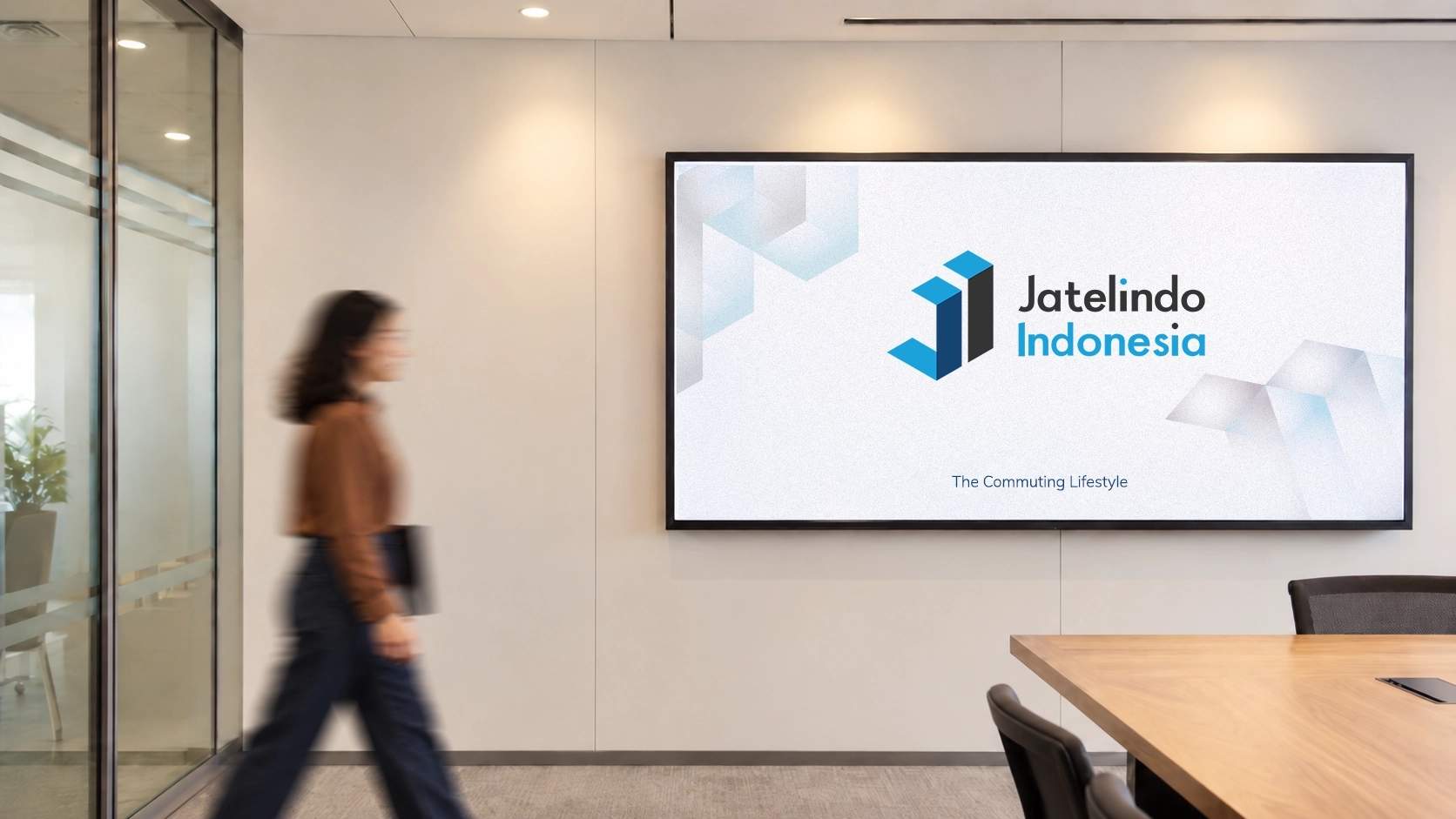 Jatelindo Indonesia corporate identity presented on a frosted wall